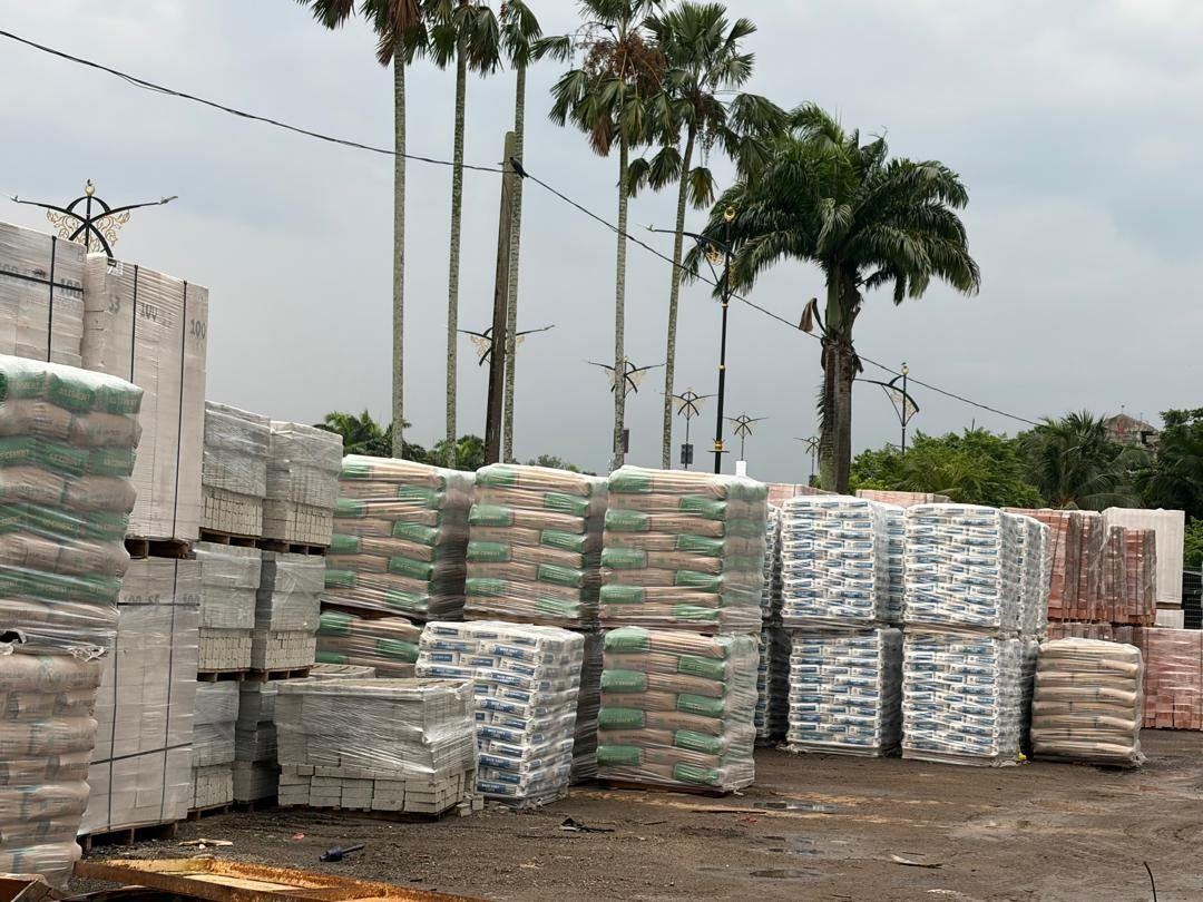 Pallets of cement, plaster and precast slabs stacked in the Sze Leong yard